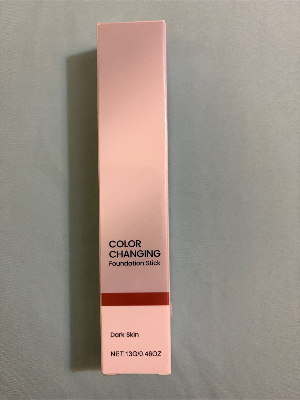 Color changing foundation stick, dark skin NIB
